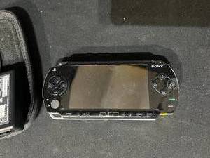 lot 169 image: Sony Playstation Portable with Case & The Italian Job Disc