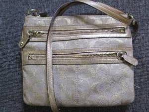 gold coach purse with matching coin...