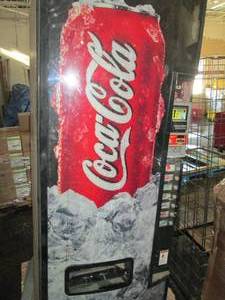 coke cola machine has key co signer...