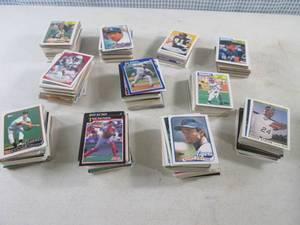 lot 102 image: (CS) Piles of Assorted Sports Cards...