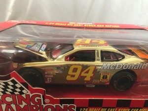 lot 15 image: 1998 NASCAR Racing Champions Bill Elliott #94 McDonalds  50th Anniversary 124 scale die cast gold stock car