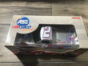 lot 24 image: 2003 NASCAR Action Car Quest Racing Jason Leffler #2 - 124 scale die cast racing truck