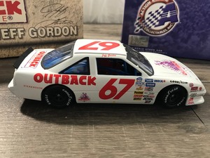 lot 29 image: 2000&nbspNASCAR Action Racing 1990 Pontiac Jeff Gordon #67  Outback Steakhouse 124 scale die cast stock car