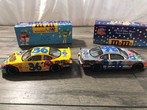 lot 35 image: 1999 NASCAR Racing Champions Ernie Irvan #36  M&Ms 124 scale die cast stock car