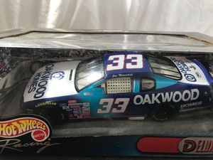 lot 38 image: 1999 NASCAR Mattel Hot Wheels Joe Nemechek #33  Oakwood Homes 124 scale die cast stock car