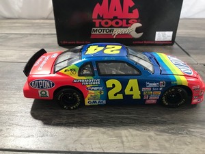 lot 65 image: 1997 NASCAR MAC Tools Jeff Gordon #24  DuPont 124 scale die cast stock car