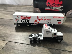 lot 74 image: 1997 JOHN FORCE NHRA GTX CASTROL  Semi HAULER 164 scale die cast