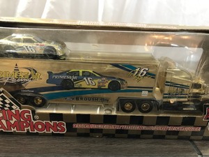 lot 90 image: 1998 NASCAR Racing Champions Commemorative Series Gold Transporter #16 164 scale die cast