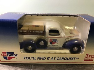 lot 102 image: Car Quest Auto Parts 1940 Car Quest Ford Pickup 124 scale die cast coin bank