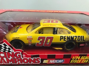 lot 128 image: 1997 NASCAR Racing Champions Johnny Benson #30  Penzoil 124 scale die cast stock car