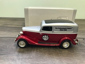 lot 154 image: Mac Tools  Spec Cast 1934 Ford Sedan Delivery car 124 scale die cast coin bank