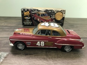 lot 169 image: 1998 NASCAR ERTL Collectibles 1949 Oldsmobile Rocket 88 - Bill France #48 Wix Filters 125 scale die cast coin bank