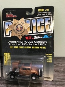 lot 182 image: 2 - 1998 Racing Champions Authentic Police Cruisers from the 1930s to 1990s die cast cars