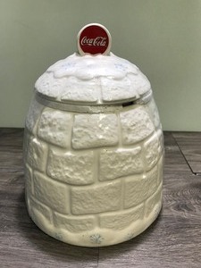 lot 231 image: Coca Cola cookie jar with polar bears and shaped like an igloo