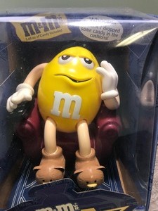 lot 254 image: M&Ms LA-Z-BOY Yellow Candy Dispenser chair recliner in box