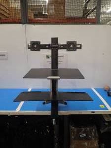 lot 48 image: Ergotron Standing Desk Setup  includes monitor screws