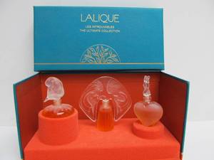 lot 64 image: LALIQUE France Mint in Box Figural Glass Small Perfume Bottle Set