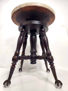 lot 233 image: Antique Claw & Glass Ball Swivel Piano Stool