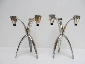 lot 347 image: Pair of Mod Atomic Style Silver Metal Tripod Design Community Candlestick Holders