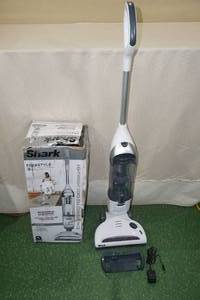 lot 21 image: Shark Navigator Freestyle Cordless Upright Vacuum