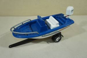 lot 113 image: Vintage Nylint Toy Boat & Trailer