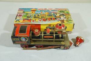 lot 114 image: Vintage Tin Train Smoking Pop Locomotive with Original Box