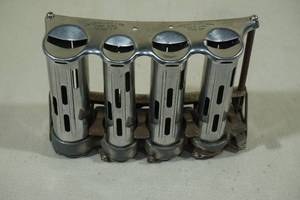lot 123 image: Vintage High Speed Coin Changer 4 Barrel Dispenser