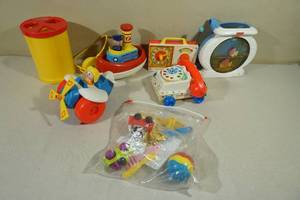lot 168 image: Assorted Vintage Fisher Price Childrens Toys - Boat, Phone, Radio