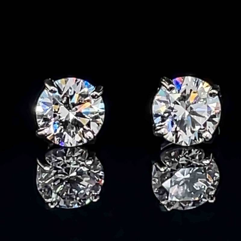 1.10 Carat Colorless Diamond Stud Earrings In 14 Karat White Gold (E-F, I2  Clarity Enhanced)