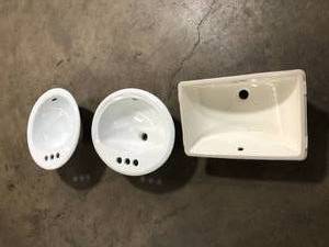 lot 23 image: Mix lot of White Bathroom Sinks, Customer returns Review all pictures