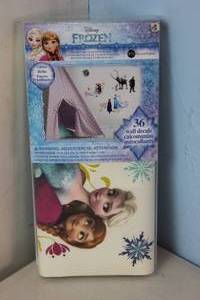 lot 166 image: NEW - RoomMates 5 in. x 19 in. Disney Frozen Peel and Stick Wall Decals