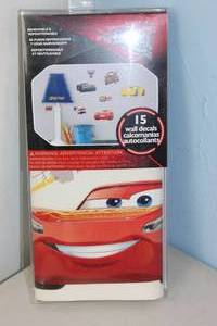lot 167 image: NEW - RoomMates 5 in. x 11.5 in. Red Disney Pixar Cars 3 15-Piece Peel and Stick Wall Decals