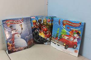 lot 216 image: NEW - 12 Chocolate Filled Advent Calendars, Marvel and Christmas Best By Date 62024