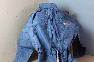 lot 538 image: Kimberly-Clark Kleenguard Chemical-Resistant Coveralls A60 45024 - Size M - Blue Packaging shows weathering, coveralls appear fine