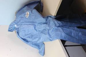 lot 531 image: Kimberly-Clark Kleenguard Chemical-Resistant Coveralls A60 45094 - Size M - Blue Packaging shows weathering, coveralls appear fine