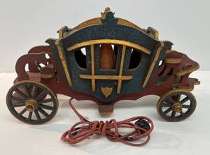 lot 28 image: Vintage Wooden Stagecoach Lamp With Metal Wheels 18L x9 14T  x 6 W