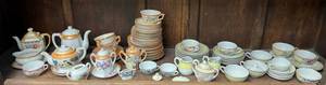lot 153 image: Shelf Full Of Misc. Vintage Miniature Tea Sets Some Made In Japan
