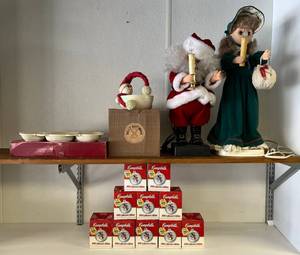lot 295 image: Two Shelves Full Of Misc. Christmas Items Including Campbells Soup Ornaments And Two Animated Characters And More