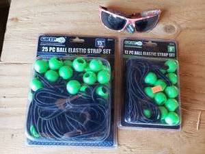 lot 35 image: 25 PC and 12 PC Ball Elastic Strap Sets and Sun Glasses