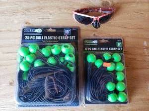 lot 36 image: 25 PC and 12 PC Ball Elastic Strap Sets and Sun Glasses