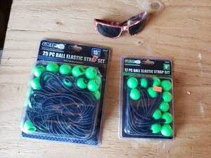 lot 37 image: 25 PC and 12 PC Ball Elastic Strap Sets and Sun Glasses