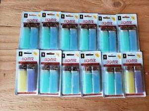 lot 40 image: 12 Packages of Lighters