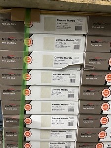 lot 66 image: 10 boxes Traffic Master Carrara Marble Peel and Stick Water Resistant Vinyl Tile Flooring (30 sqftcase)