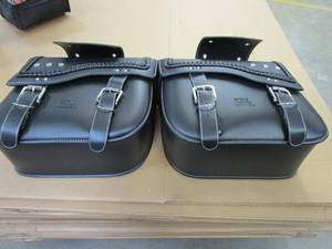 lot 657 image: Synthetic Leather Double Strap Studded Saddle Bags 30L Fit For Harley (MISSING TIES TO STRAP THEM TOGETHER)