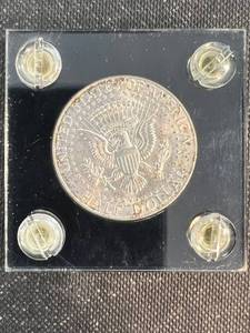 1964 KENNEDY SILVER HALF DOLLAR BU TONED IN BLACK CAPITAL HOLDER