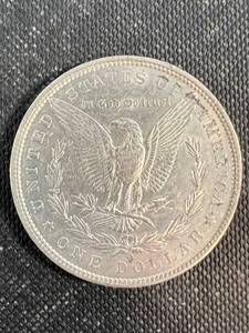 1900-O MORGAN SILVER DOLLAR AU (LOOKS MUCH BETTER IN HAND)
