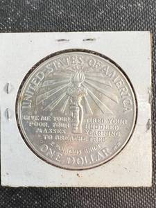 1986 US SILVER DOLLAR ELLIS ISLAND COMMEMORATIVE