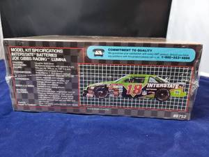 lot 10 image: Interestate Batteries Joe Gibbs Racing Lumina #18 Model Kit - Unopened