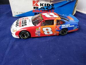 lot 11 image: Team Caliber KMart #8 Nascar Kids Race Against Drugs Ford Taurus Die Cast Car