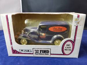 lot 20 image: Our Own Hardware 1932 Ford Panel Delivery Truck Bank by Ertl Die-Cast Metal